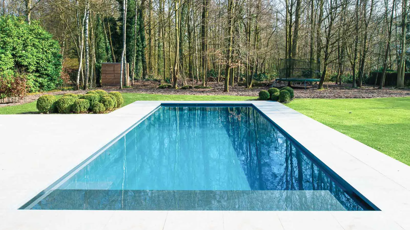 Leisure-Pools-Pinnacle-Fiberglass-Pool-Model-Hero The Cube™ with Cover, a fiberglass pool design manufactured by Leisure Pools