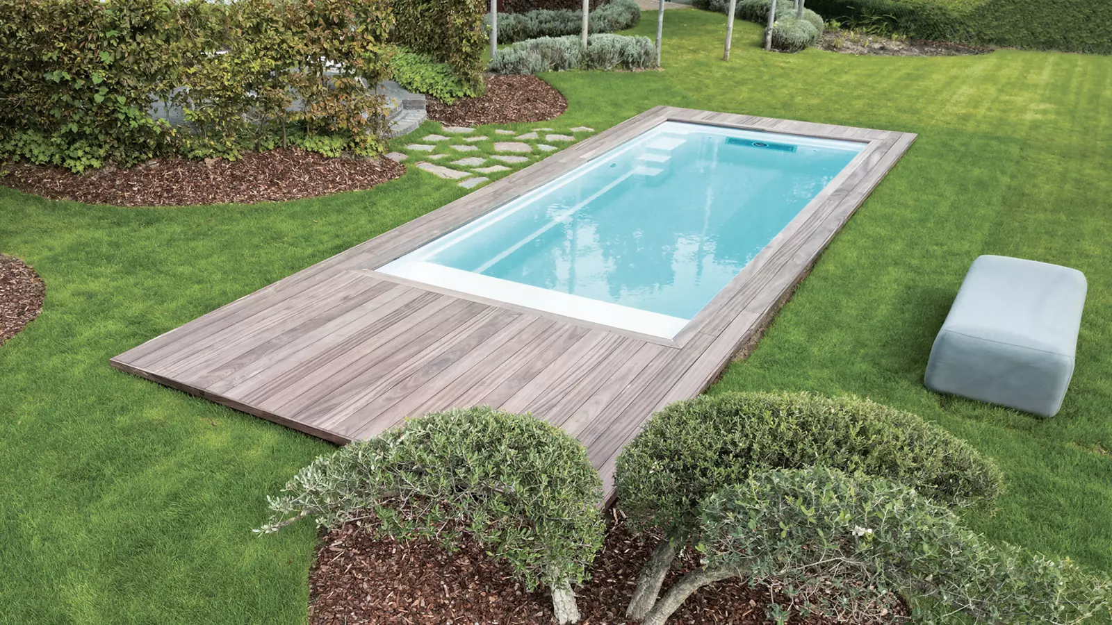 Leisure-Pools-Pinnacle-Fiberglass-Pool-Model-Hero The Encore™ with Cover, a fiberglass pool design manufactured by Leisure Pools